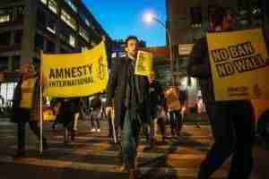 236416_Amnesty International Activists protest against President Donald Trump_s immigration policies 3