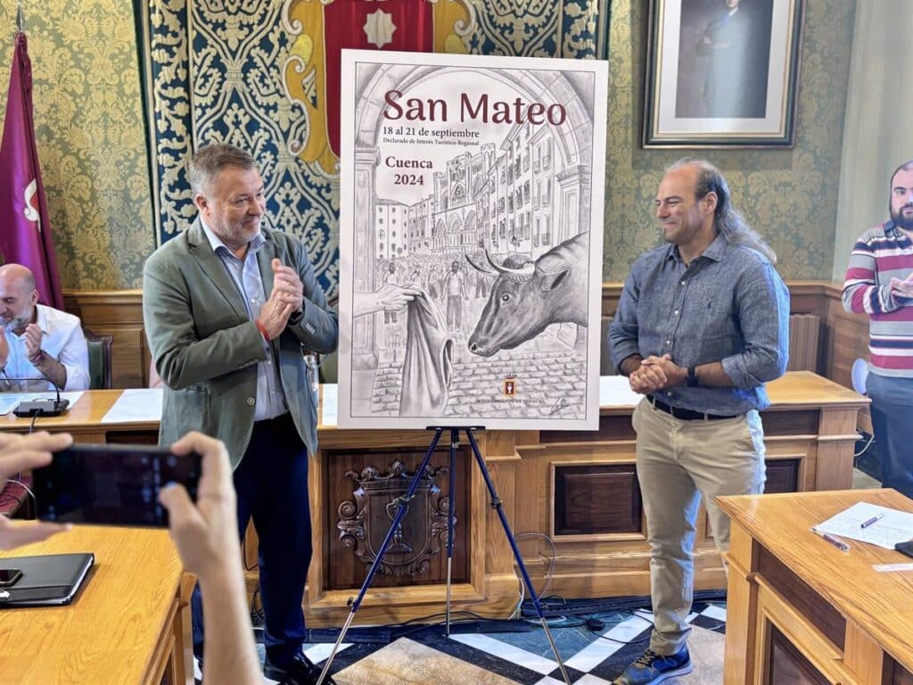 Una vaquilla bajo los arcos del Ayuntamiento protagoniza el cartel de las fiestas de San Mateo de Cuenca