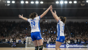 Two female handball players celebrating a goal during an indoor arena match, dynamic action shot, realistic photojournalis...
